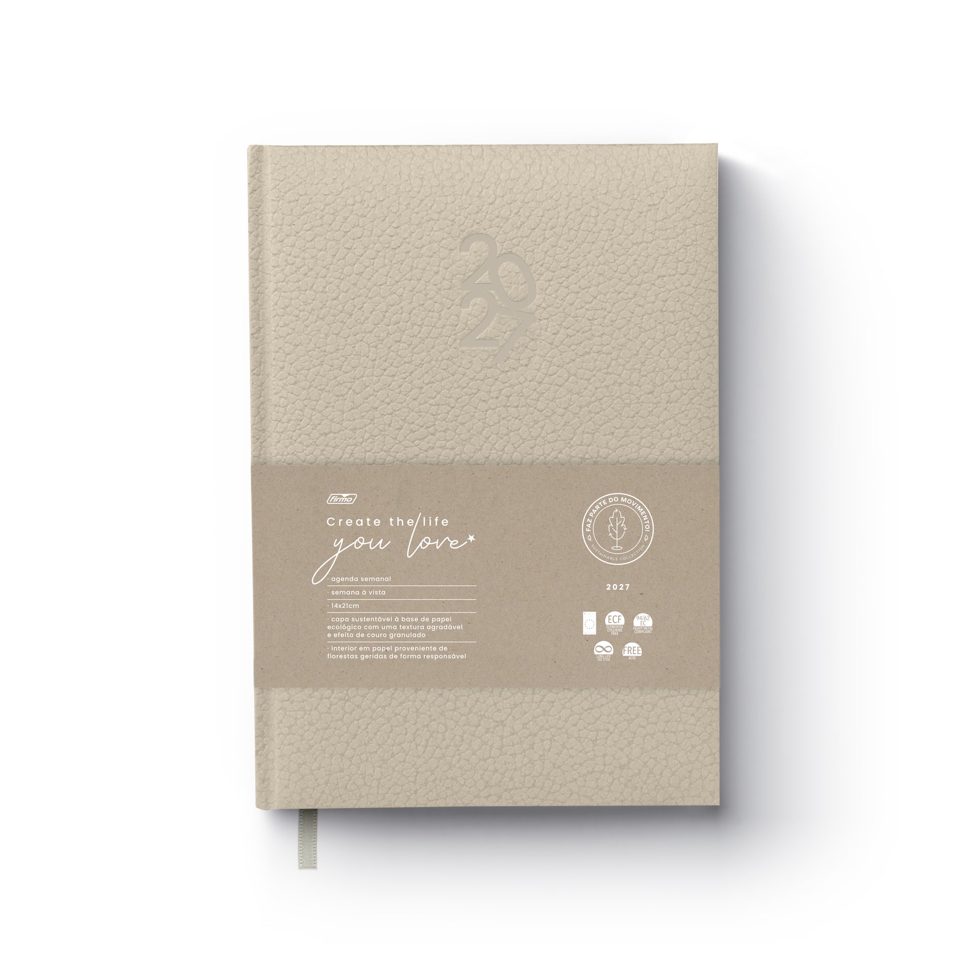 Agenda semanal de 2027 Eco Pearl da Firmo com capa almofadada bege texturada, exibindo uma cinta em papel kraft com a frase "Create the life you love" e certificações ambientais, sobre fundo branco.