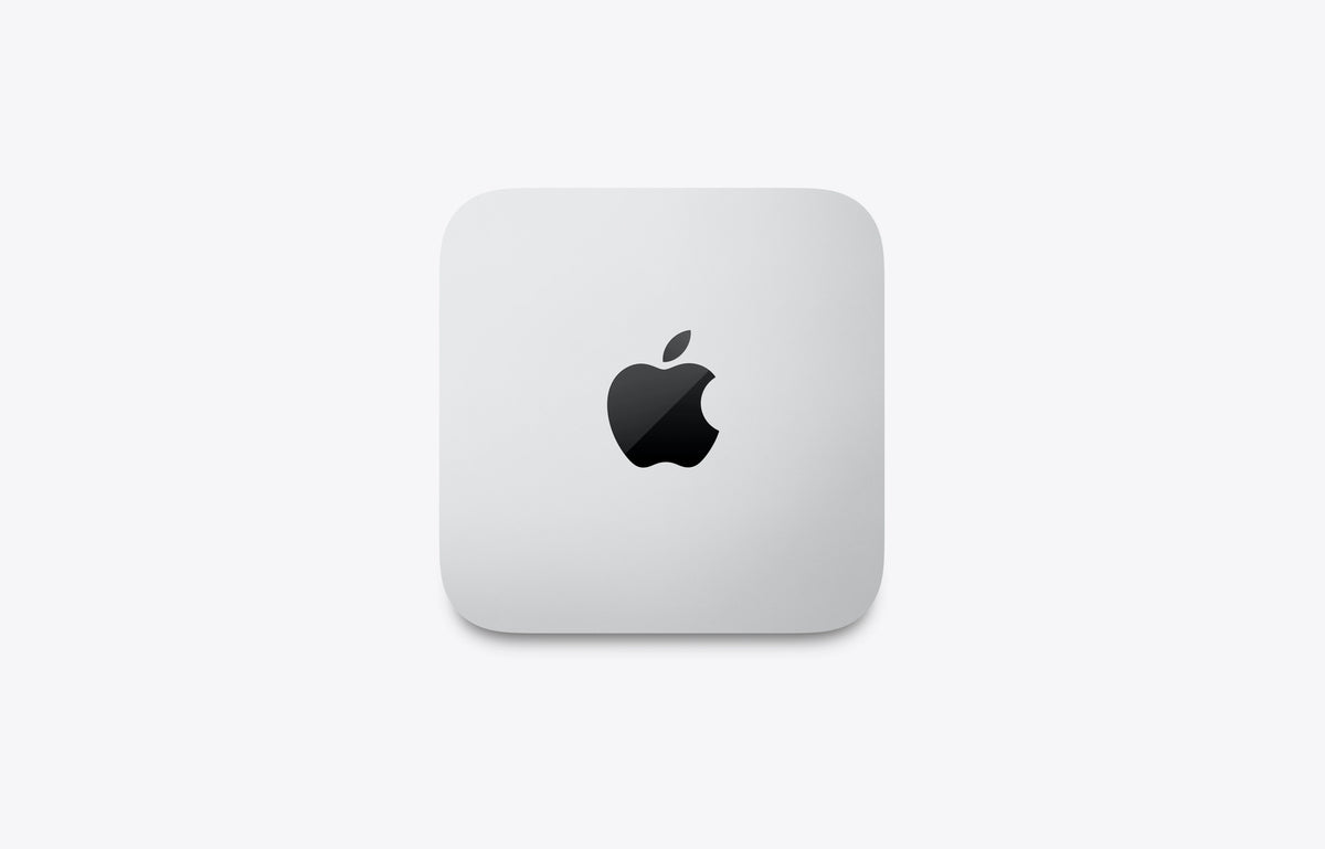 Computador Mac Studio quadrado cinzento com logótipo Apple na tampa