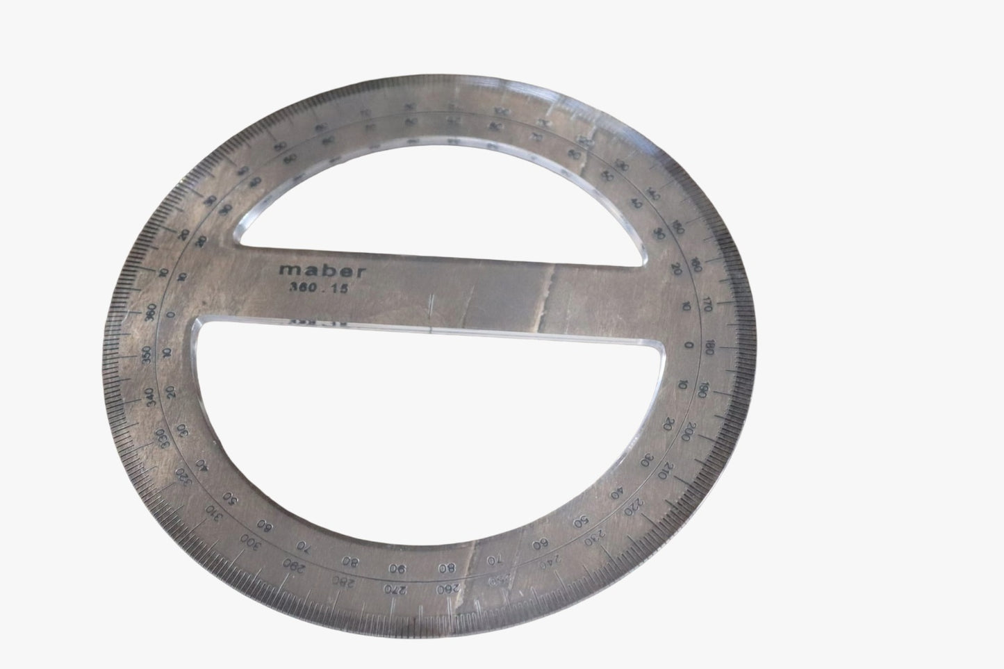 Transferidor circular transparente de 15 cm da marca Maber, com escala completa de 360 graus impressa em preto nítido, apresentado sobre fundo branco.